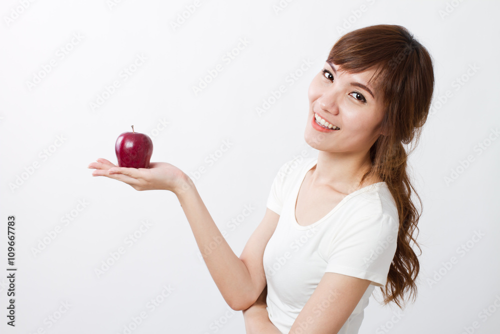 healthy asian woman with red apple, looking at you healthy asian woman with red apple, looking at you