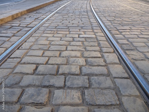 tram line in a cobble stone pavement