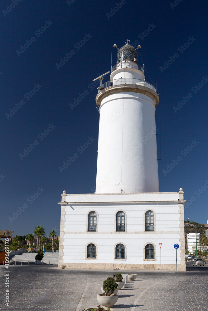 White lighthouse in Malaga, Spain