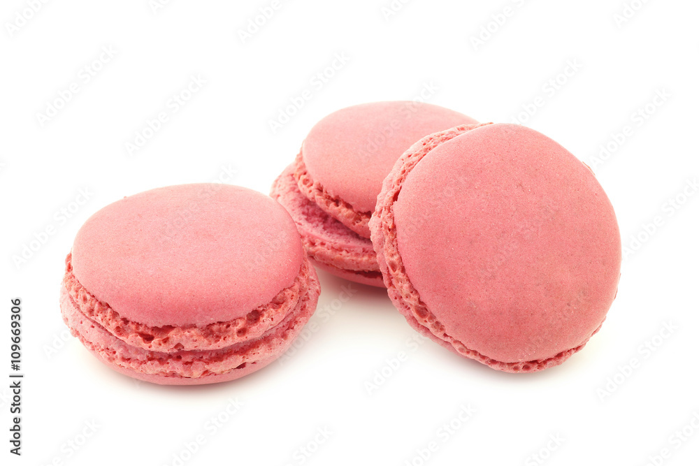 colorful freshly baked macarons on a white background colorful freshly baked macarons on a white background