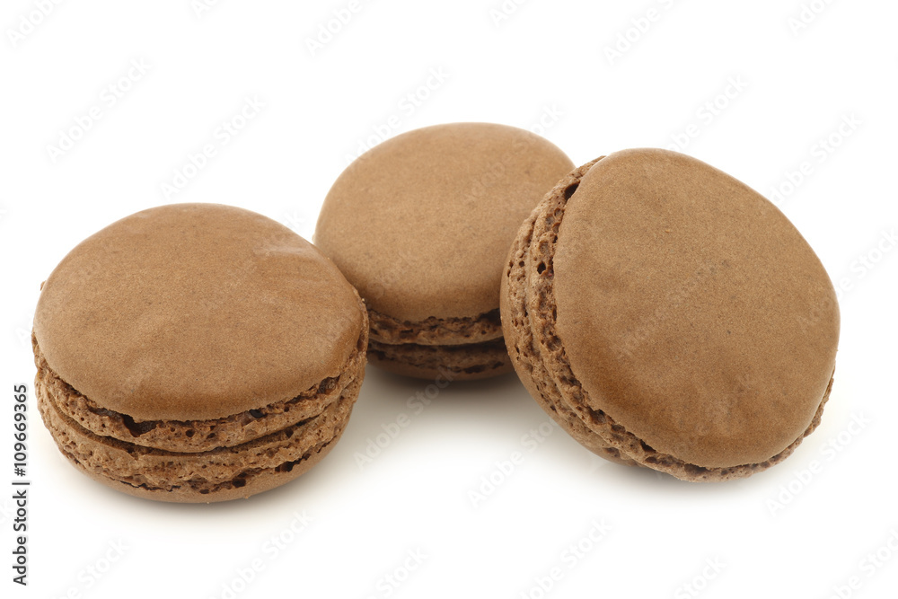 colorful freshly baked macarons on a white background colorful freshly baked macarons on a white background