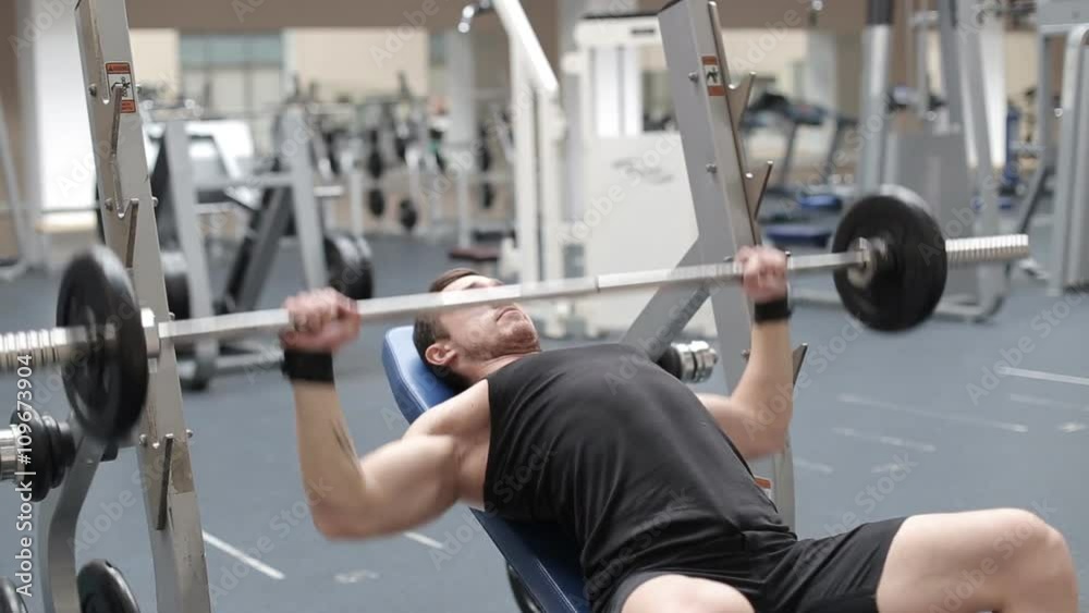 Man bench pressing weights