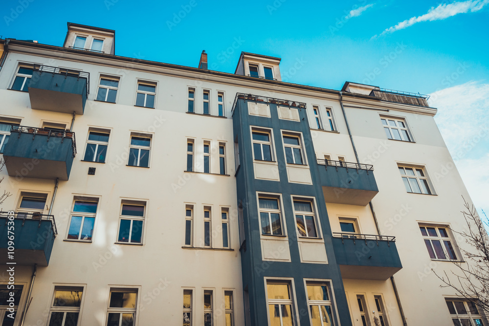 Naklejka premium orange facade with dark balcony