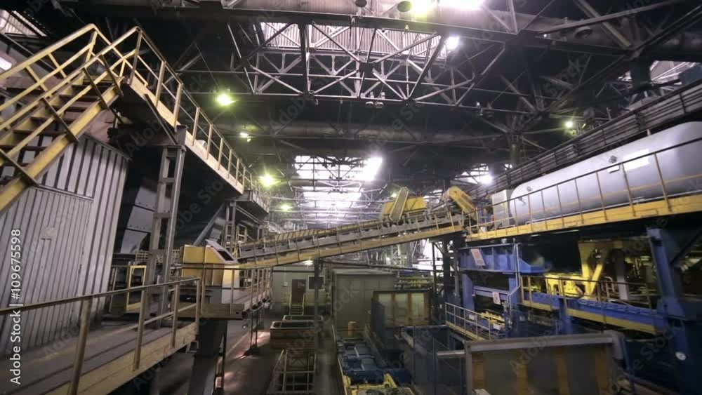 Industrial interior of a huge plant building. Inside view. HD. Industrial interior of a huge plant building. Inside view. HD.