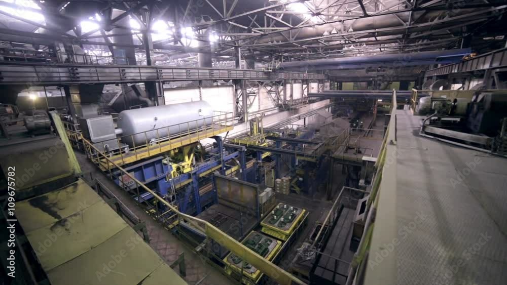 Industrial interior of a huge plant building. Inside view. HD. Industrial interior of a huge plant building. Inside view. HD.