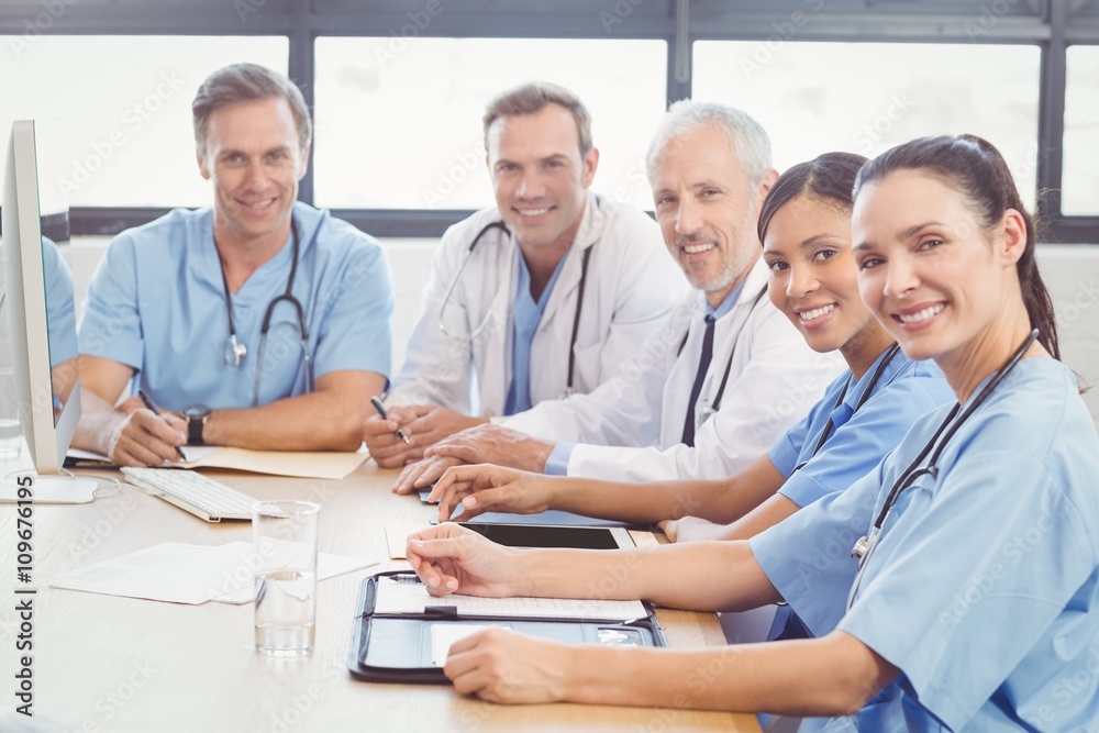 Portrait of happy medical team in conference room Portrait of happy medical team in conference room