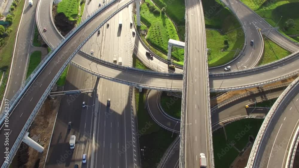 Unique flyover the complex road junction. Sunny day, sunset. Modern Russia. Moscow aerial high altitude drone flight. Ultrahd 4K. Fifa 2018
