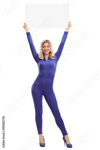Racing girl holding a blank white signboard