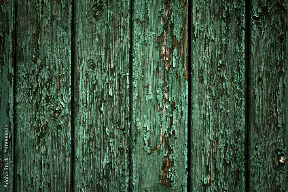 Wood texture or background. Old, rusty panels or planks painted in green color. Wood texture or background. Old, rusty panels or planks painted in green color.