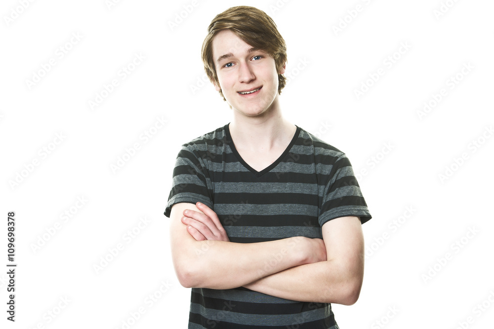 young teenage boy being photographed in a studio. young teenage boy being photographed in a studio.
