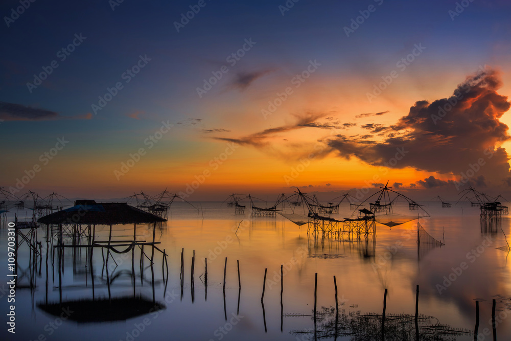 Sunrise over Pak Pra lake in Phatthalung,Thailand Sunrise over Pak Pra lake in Phatthalung,Thailand