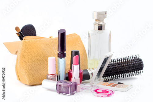 cosmetics isolated on white background. Pink lipstick, mascara,