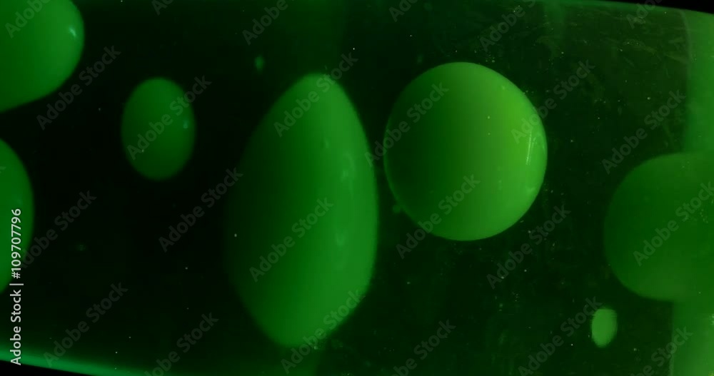 4k lava lamp retro background 60s 70s sixties seventies vintage hippie green fluis floating melting wax medical blood