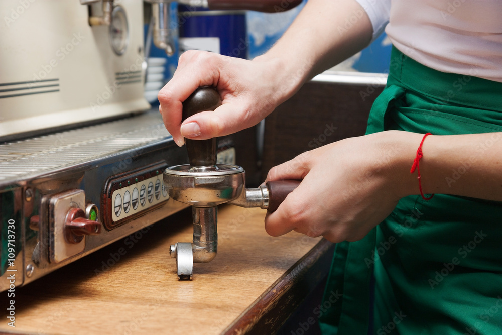 woman presses the coffee woman presses the coffee