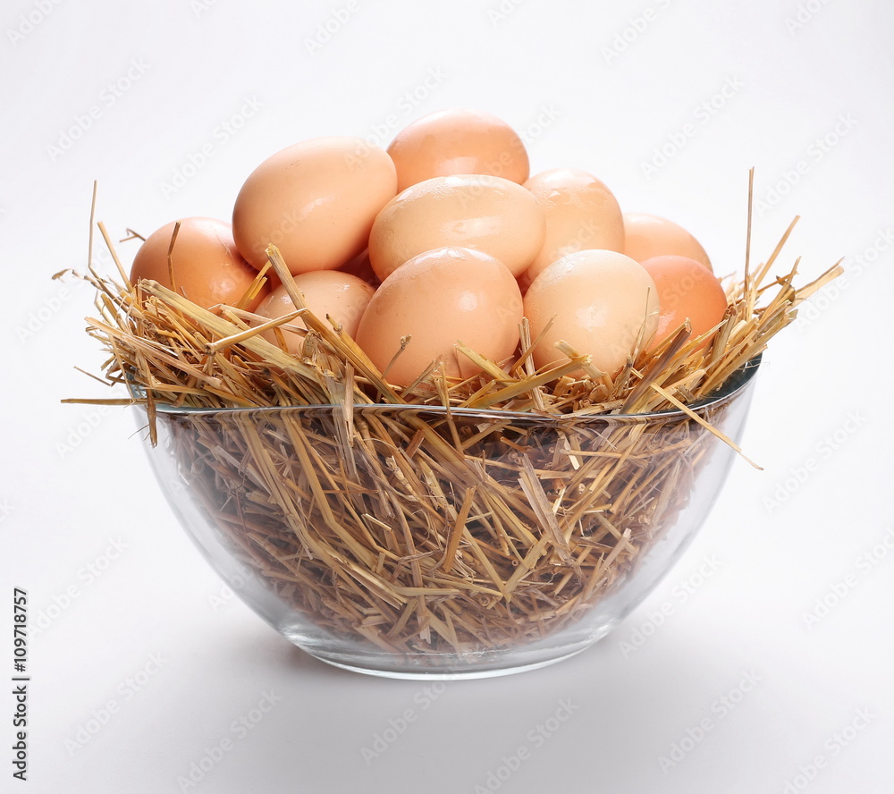 Bowl of eggs with straw isolated on white background Bowl of eggs with straw isolated on white background