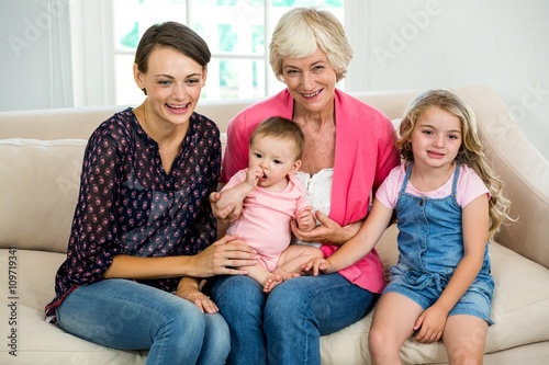 Smiling multi generation family with baby
