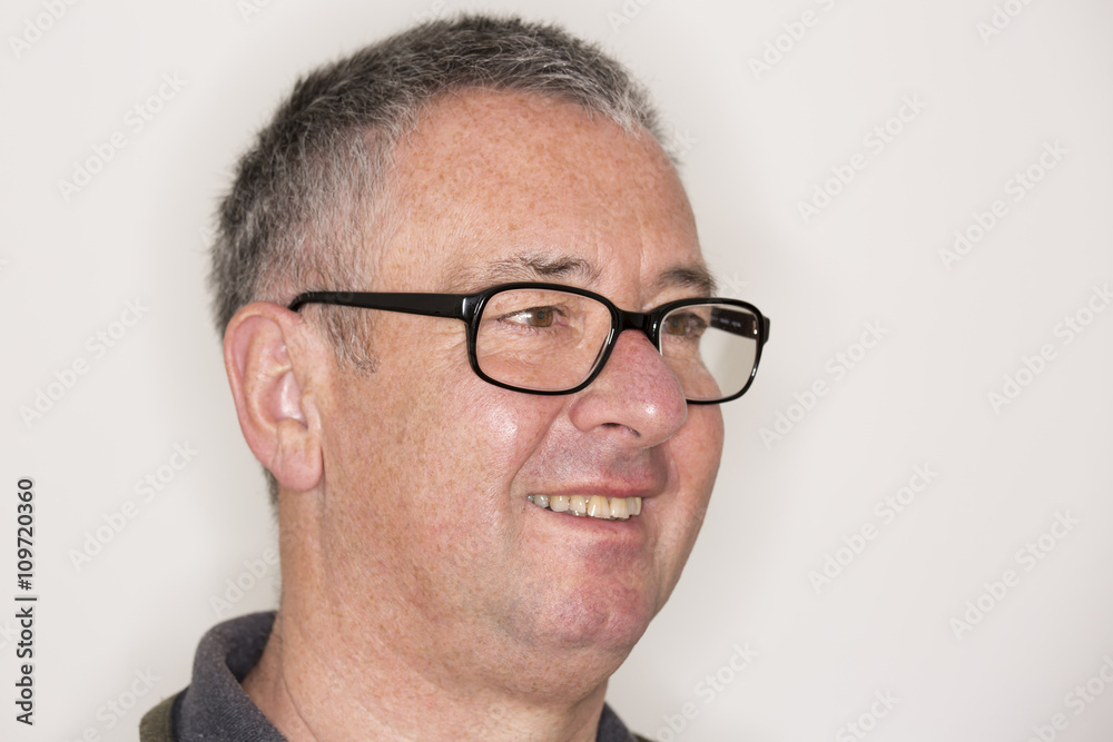 Portrait of a mature man with glasses