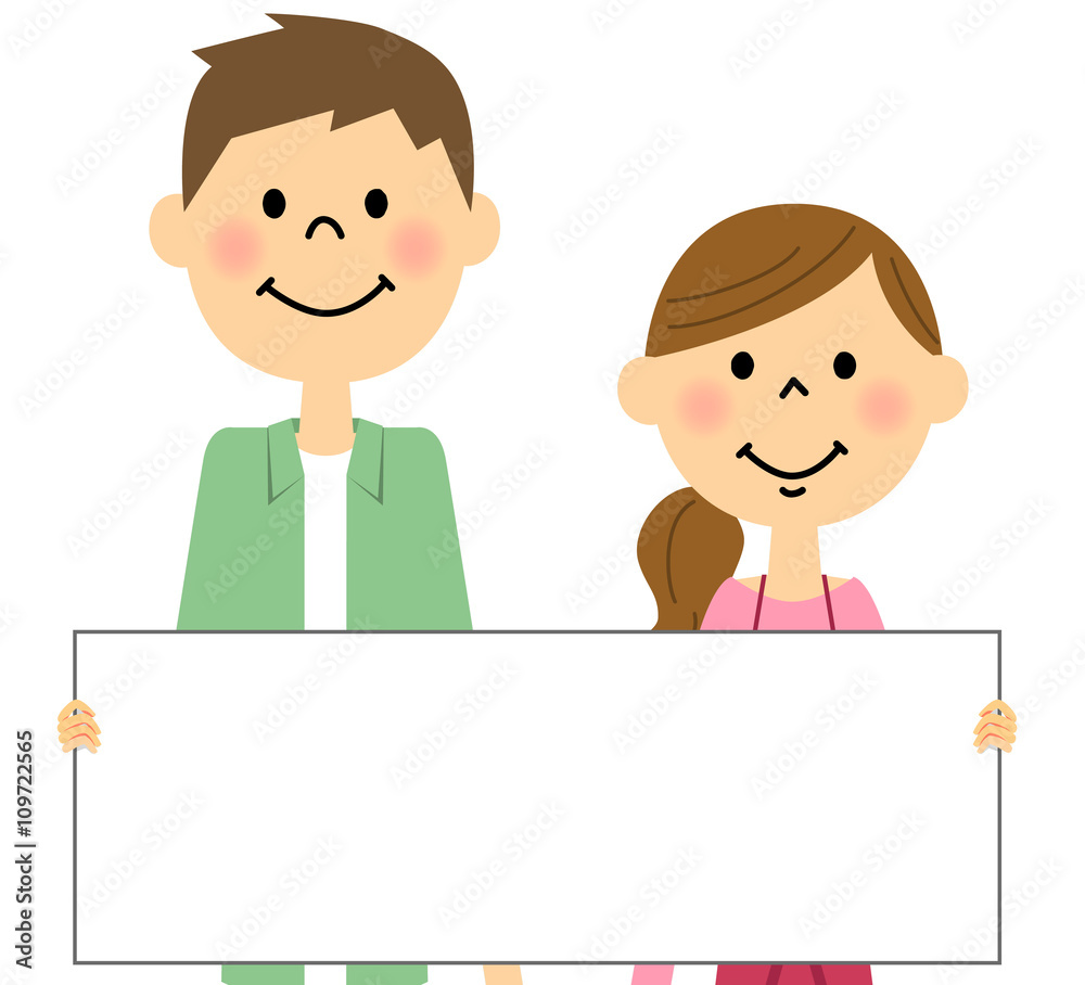 パネルを持つ若いカップル　