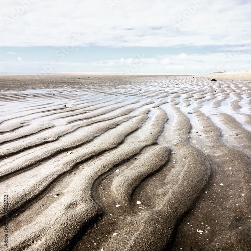 Ripples in the sand on the beach, Maasvlakte Strand, Holland photo