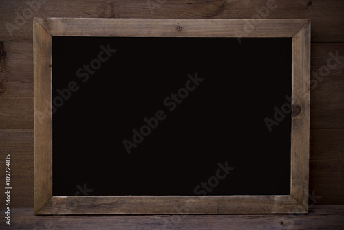 Black Chalkboard With Copy Space Wooden Background