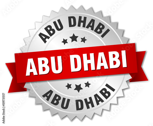 Abu Dhabi  round silver badge with red ribbon