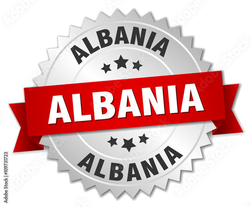 Albania round silver badge with red ribbon
