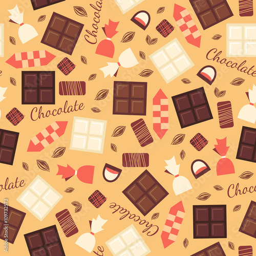 Seamless pattern with chocolate sweets isolated on beige background.