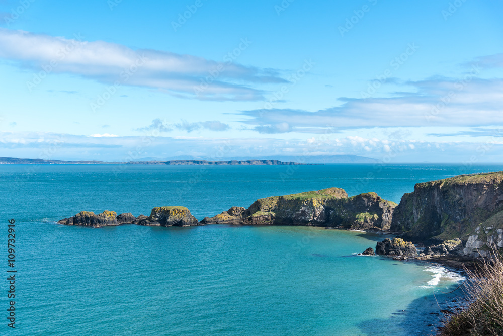 County Antrim Coast. Carrick-a-Rede, with Rathlin Island in the distance.