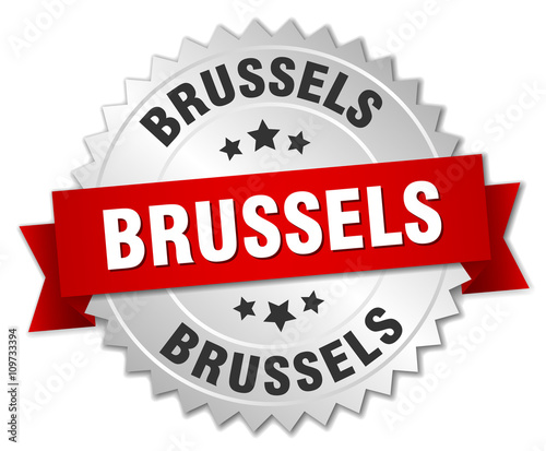 Brussels  round silver badge with red ribbon