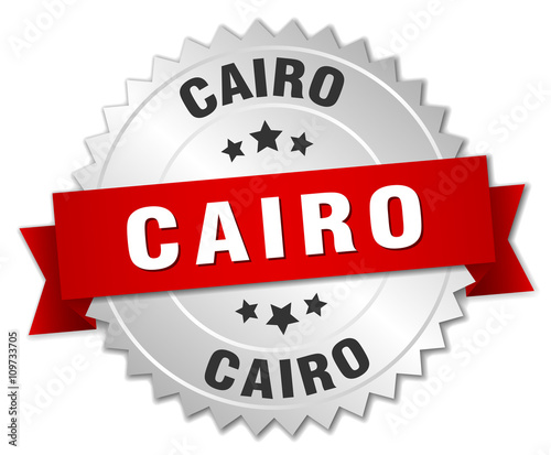 Cairo  round silver badge with red ribbon