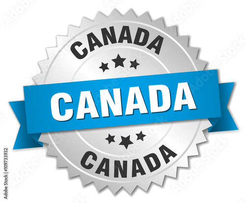 Canada round silver badge with blue ribbon