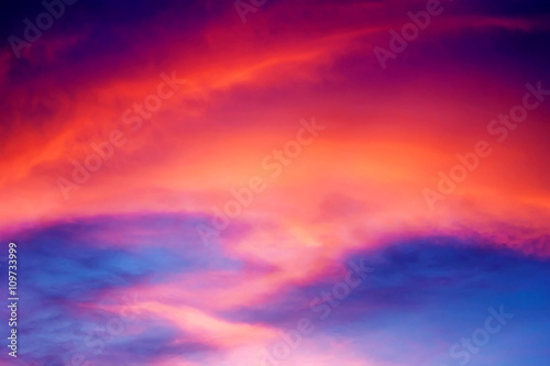 Sunset with orange zigzag clouds. © dr_vlat