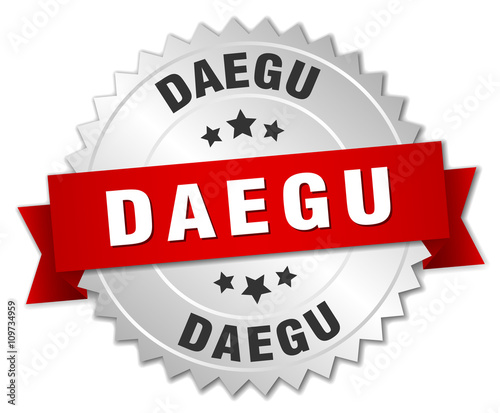 Daegu  round silver badge with red ribbon
