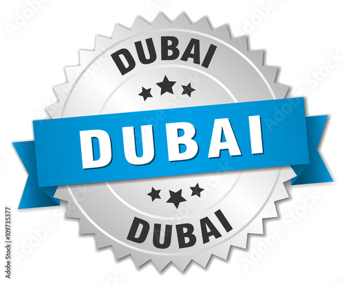 Dubai round silver badge with blue ribbon