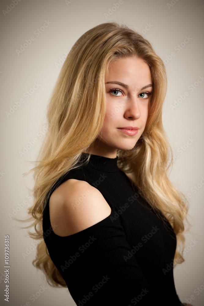 Beautiful young woman with gorgeous hairstyle posing over white Beautiful young woman with gorgeous hairstyle posing over white