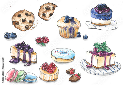Collection of different cakes with berries and chocolate - cookies, cupcake, macaroni, donut, pie