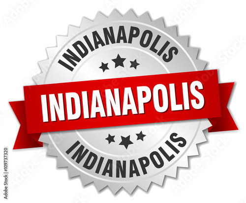 Indianapolis round silver badge with red ribbon