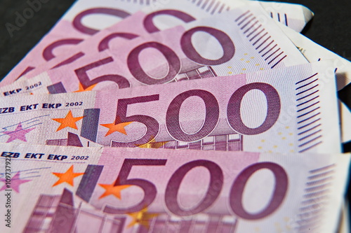 A stack of money five hundred euros on a black background