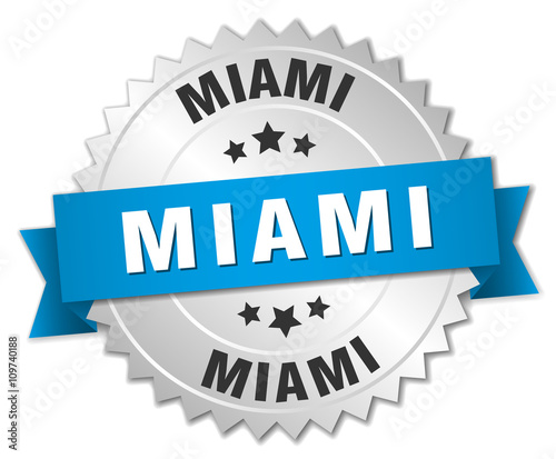 Miami round silver badge with blue ribbon