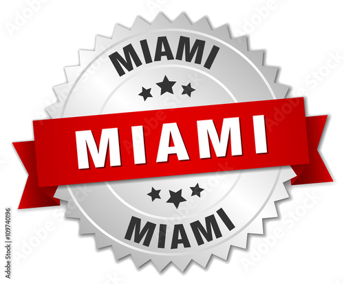 Miami  round silver badge with red ribbon