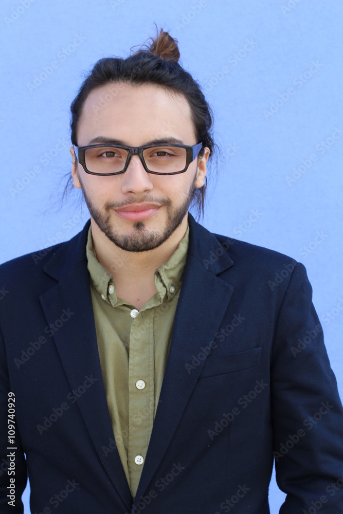 business, startup, inspiration and people concept - happy Mediterranean man with beard and hair bun. business, startup, inspiration and people concept - happy Mediterranean man with beard and hair bun.