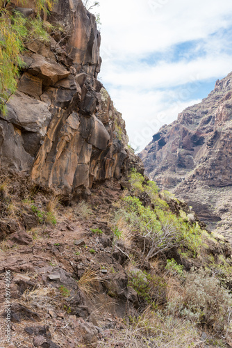 Hike in the Argaga Canyon, The Barranco de Argaga is next to the Valle Gran Rey. The trail is heavy to hike and with the steep slopes a bit dangerous to walk. It is a steeply path through the gorge 