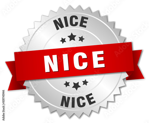 Nice  round silver badge with red ribbon