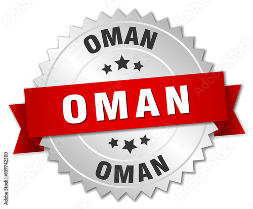 Oman  round silver badge with red ribbon