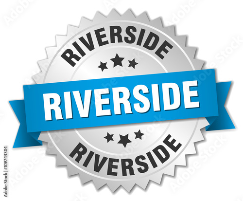 Riverside round silver badge with blue ribbon