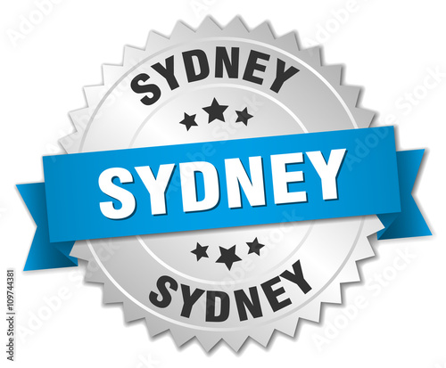 Sydney round silver badge with blue ribbon