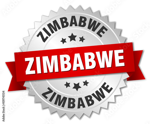 Zimbabwe  round silver badge with red ribbon