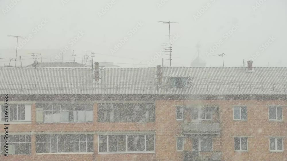 Roof of a block under the snowstorm Roof of a block under the snowstorm