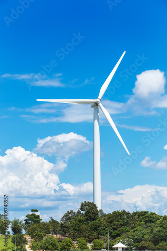 Wind turbine front view on blue sky