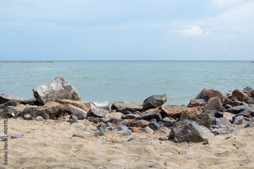 Many big rock sand beach horizon
